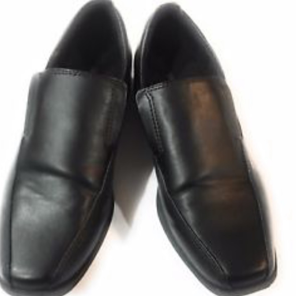 Boys Smart-fit black dress shoes.
